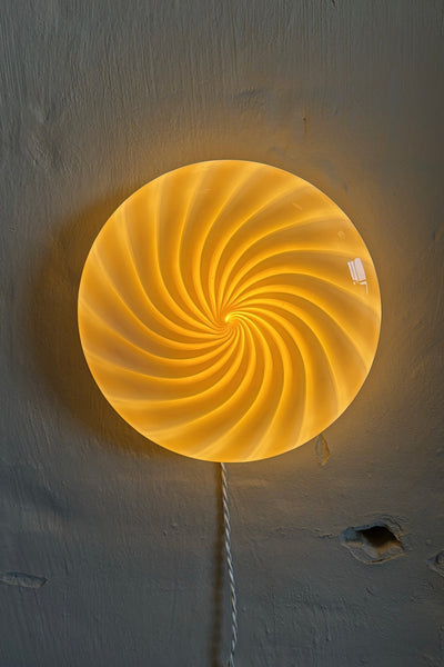 Murano ceiling light in caramel/cream with swirl pattern, round shape and soft light from a unique angle